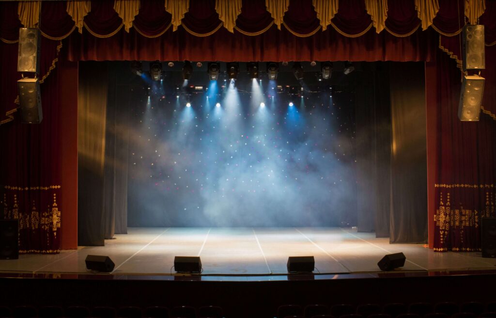 Lights on an empty stage.