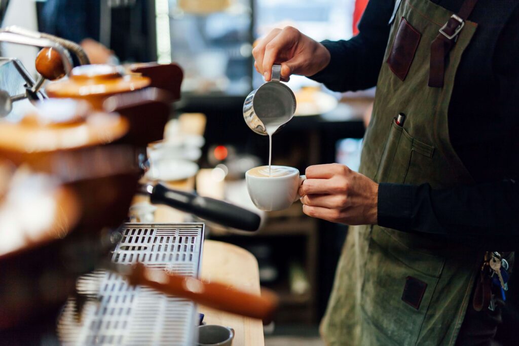 Barista making coffee.