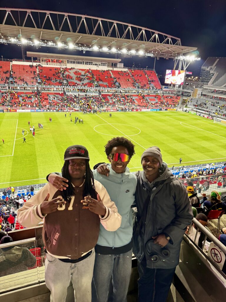 Students at soccer game.